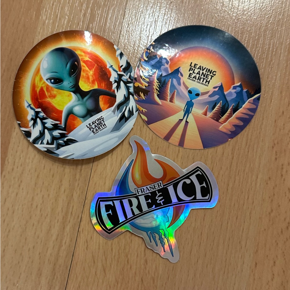 Metallic leaving planet earth alien stickers